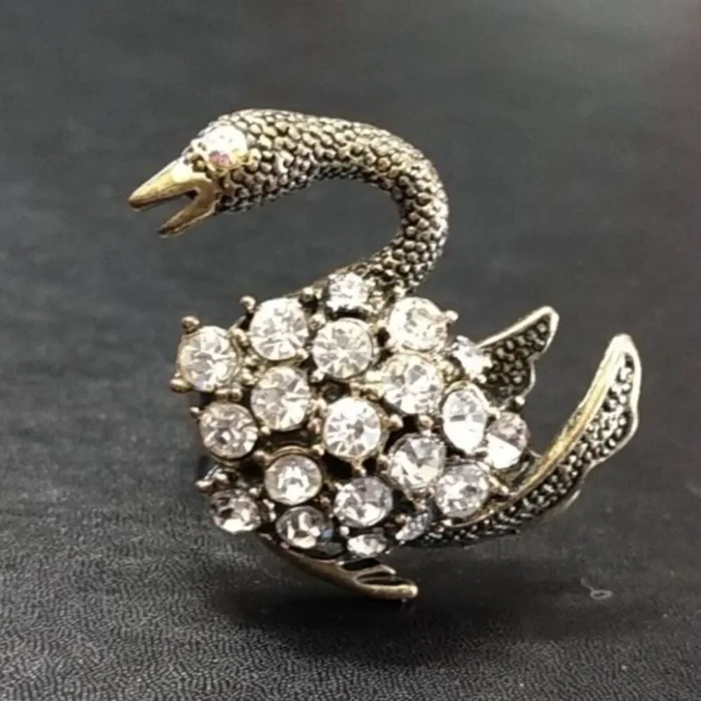 Bronze colored clear rhinestone swan statement ring adjustable